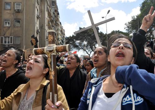 Egyptian Coptic Christians take part in a protest in front of the Information center building in Cairo, Egypt, 09 March 2011. The Coptic Christians were protesting over the burning of a church in Cairo suburbs on 04 March. Photo by Ahmed Asad/Credit:AHMED ASAD/APA IMAGES/SIPA/1103091853